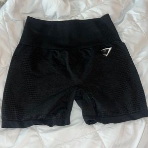 Black gym shark shorts size small.